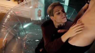 Two sweet guys share an inflatable chair