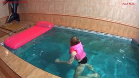 Alla wears a pink inflatable vest and rides hotly on a pink inflatable mattress in the pool!!!