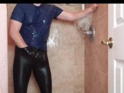 Spandex boy getting wet and soapy in shower in tights after yoga class