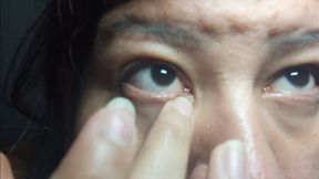 Delicate Eye Scratching Close-Up