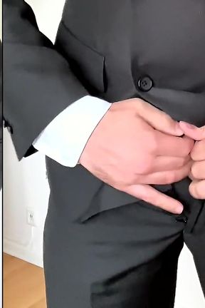 Suited Businessman Jerking off