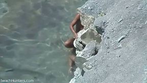 Horny couple thinks they can hide behind rocky coast (real voyeur)