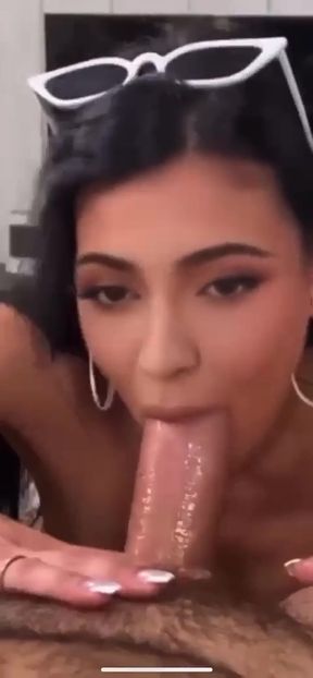 Amateur celebrity Kylie Jenner exposed giving a sloppy blowjob in a group settin