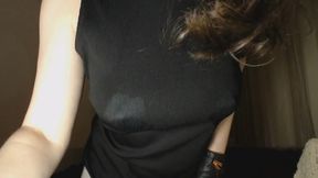 Milking her tits through black dress