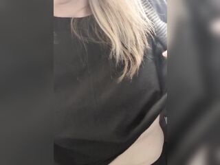 Teacher flashes and rubs teat in the classroom