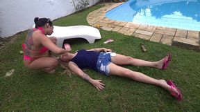 my sissy slut licked and massaged my feet in the pool