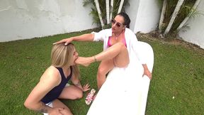 my sissy slut licked and massaged my feet in the pool