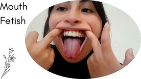 I play with my tongue and open my big mouth for you..