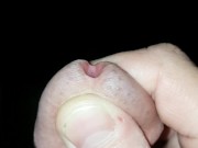 Horny guy is cumming into glas of water