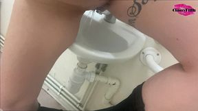 pissing in the work sink and playing with it