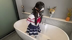 Chinese Girl In School Costume Tied In Diferent Positions