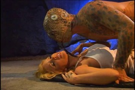 Rugged mutant seduces the beauty in the cave before fucking her mercilessly