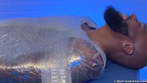 Hairy Dallas gets tickled raw by muscled feet while bound and stuffed