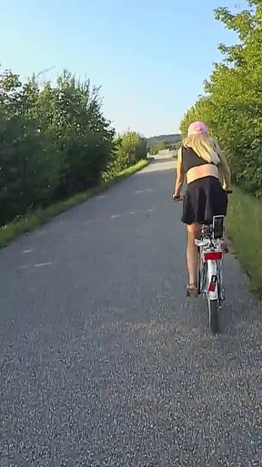 Public Nudity While Cycling!! Tranny Girl Rides Not Only the Bike, Also a Dildo!