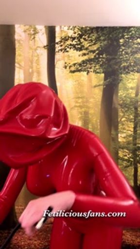 Miss Fetilicious putting on red 0.8 mm ball hood before shoot