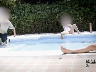 Having fun in a pool of a swinger club!!