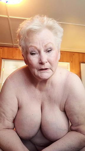 Nasty Granny Showing Off Her Fat Pussy As She Rubs It With A Dildo