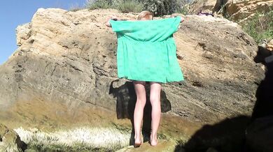 MILF squirts shaking orgasm on beach with toys