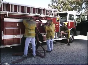 Starving blonde whore is serving the whole fire team right on the fire-truck