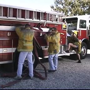 Starving blonde whore is serving the whole fire team right on the fire-truck