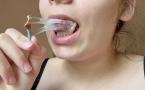 A Giantess Stepmom Traps Her Tiny Ex-husband in a Trap Made of Chewing Gum She Chews, Blows Bubbles,