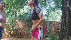 Wearing out her flat stomach