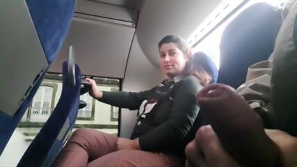 MILF gets seduced into sucking and jerking his big dick on a public bus