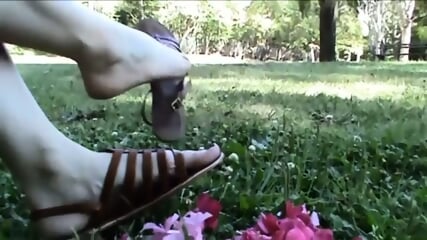 Christine Rubs Pink Petals With Her Sandals  Kinky4Ever