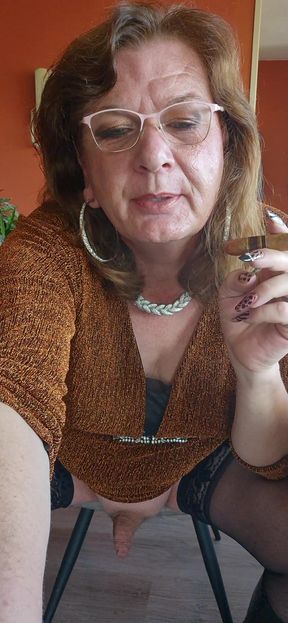 Drinking a nice glass of champagne while enjoying a cigar