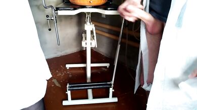 Caring female doctor taking a cum analysis on her knees