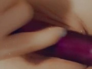 Hot, young Milf banging herself with favorite purple vibrator