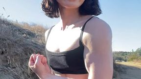 Petite cute and fit Asian girl on a hike in nature flexes her muscles and flashes her tits and pussy