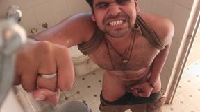 A indian boy was peeing hard in her toilet