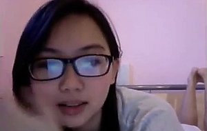 Asian teen with glasses webcam show