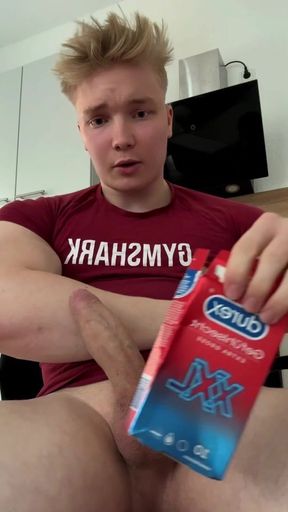 German blond Tim jerking off and cumming in a condom