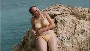Horny Redhead Babe Fingers Pussy on Wild Beach