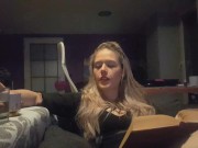 reading a book and smoking cigarette