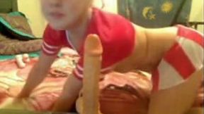 Kinky blonde teen voraciously gobbles and strokes a dildo with her mouth