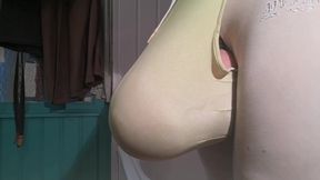 Pissing inside a xxxlarge condom