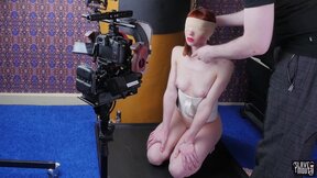 Blindfolded redhead slavegirl gagging cock