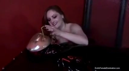 Goddess in latex dominating immobilized femdom slave