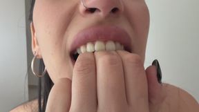 I bite my fingers and leave the marks of my teeth.