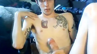 Tattooed amateur Alex with glasses jerks off and cums in solo session