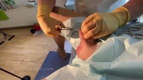 Dominatrix mistress April - clinical cock sewing