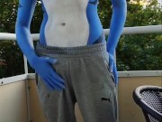 Bodypaint shark teases on balcony