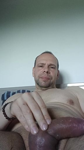 I aim for my face but the cum lands on my shoulder