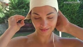 ”Hungarian baddy Lidia gets lustful underwater with twat”