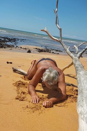 Ladysilva on the beach in panties showing off her hot ass