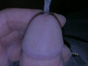 Pissing with my cigarette still smoking between my fingers