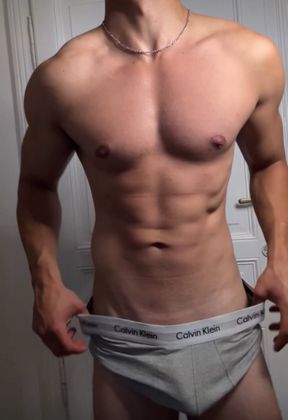 Athletic Muscle Guy Showing Off After a Workout
